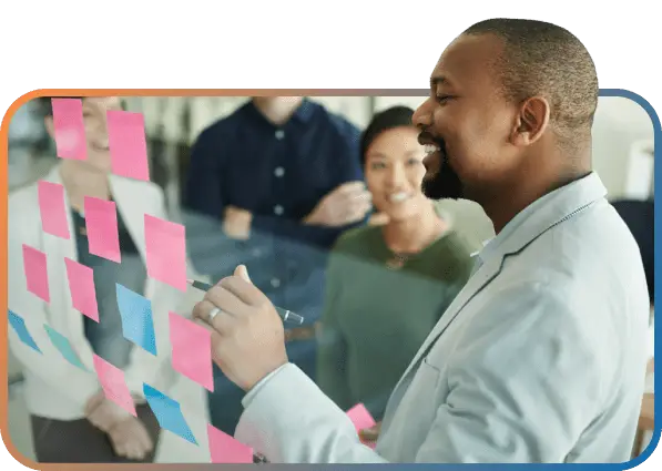 Landing-Page-ManageIT Diverse business team collaborating in modern office environment with digital connectivity